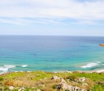 Ramla Bay overlooked from Calypso Cave in Gozo
