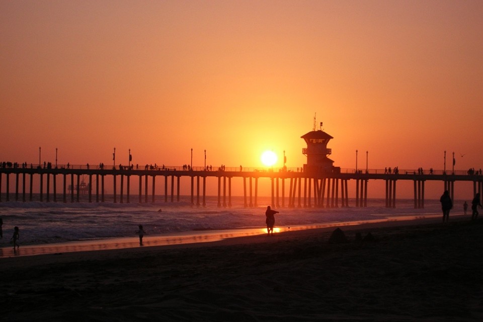 Sun setting over Huntington Beach, California